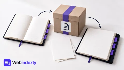 Two notebooks connected through a paper backup box.